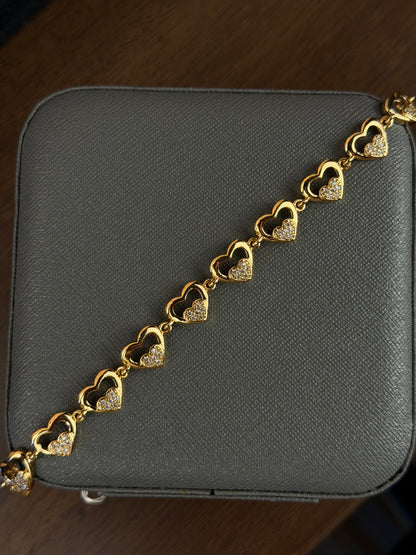 Pulsera corazones engarzados